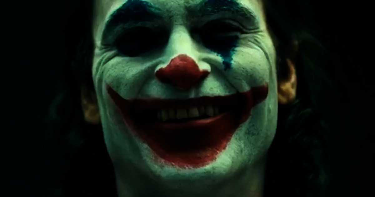 Joaquin Phoenix In Goofy Joker Suit Reveals Job