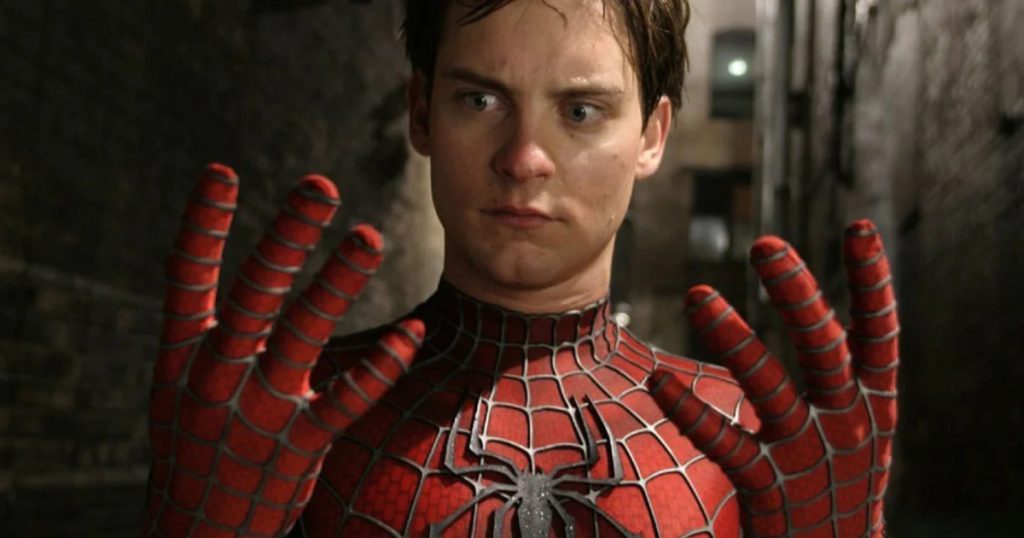 tobey-maguire-holding-out-spider-man-return