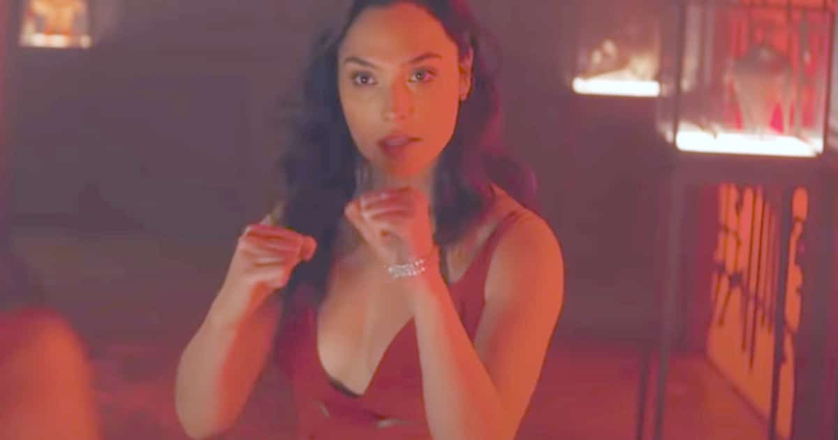 Watch Gal Gadot Beat Up Dwayne Johnson and Ryan Reynolds In ‘Red Notice’ Clip