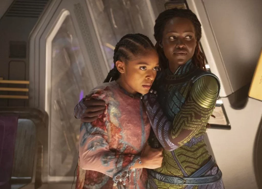 Black Panther: Wakanda Forever: Dominique Thorne as Riri Williams and Lupita Nyong'o as Nakia