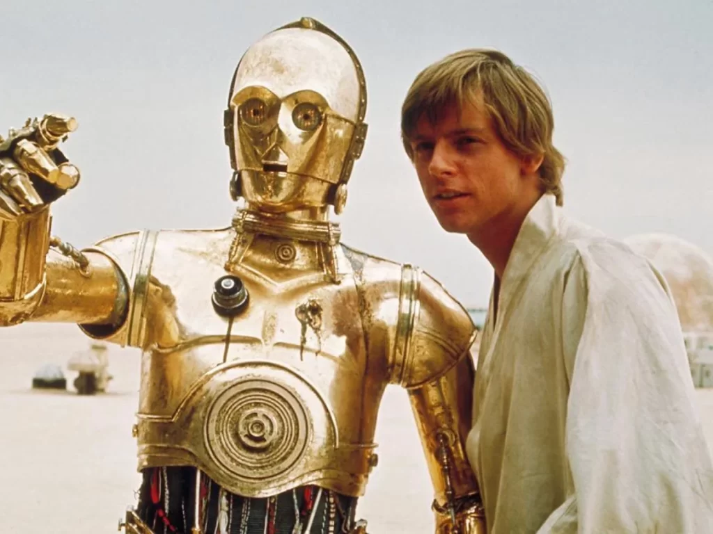 C-3PO and Mark Hamill as Luke Skywalker 